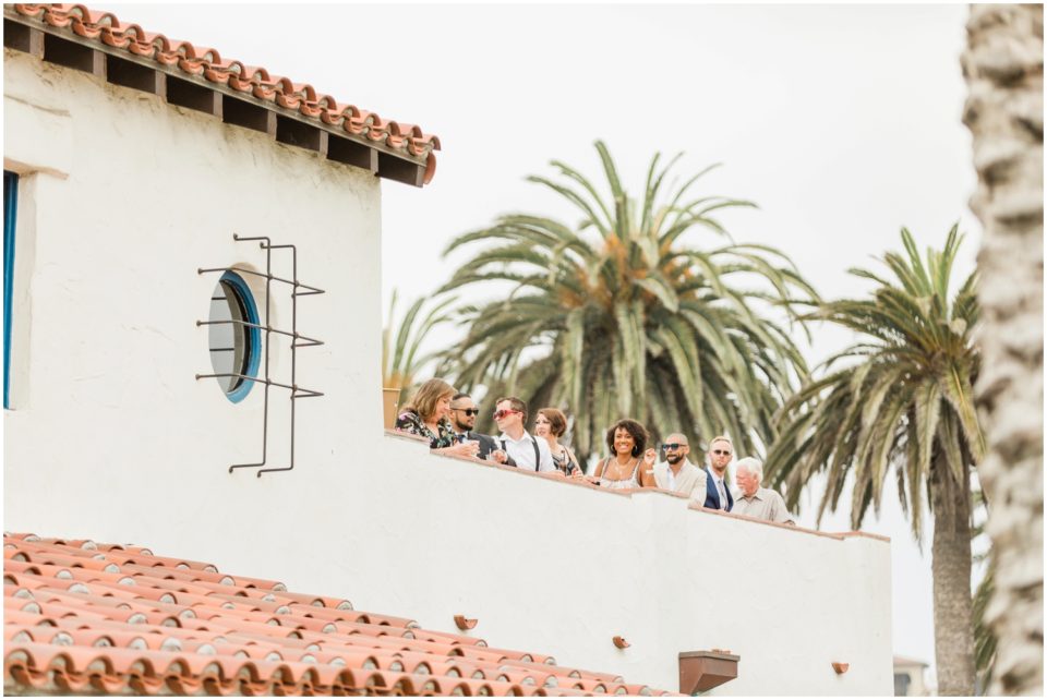 guests enjoy cocktails on rooftop terrace photo | Ole Hanson Beach Club San Clemente Wedding Photographer | © Kristine Marie Photography