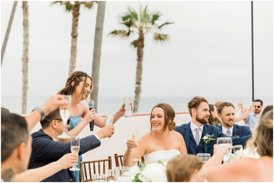 toasts rooftop terrace reception photo | Ole Hanson Beach Club San Clemente Wedding Photographer | © Kristine Marie Photography