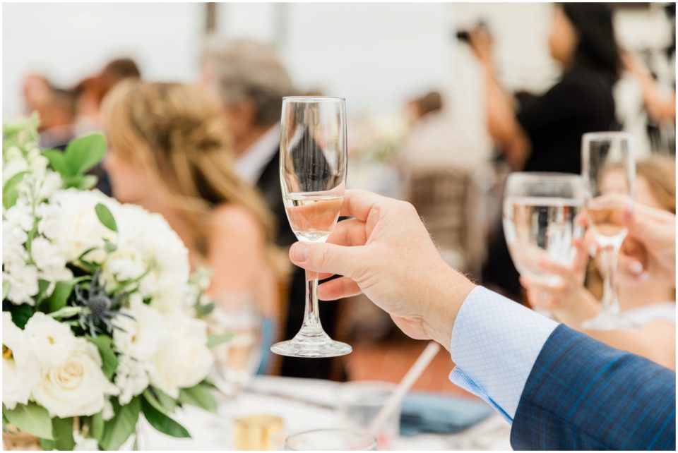 cheers champagne glass photo | Ole Hanson Beach Club San Clemente Wedding Photographer | © Kristine Marie Photography