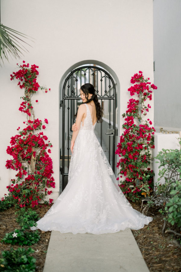 La Jolla Woman's Club Wedding Photographer | Bride with bougainvillea